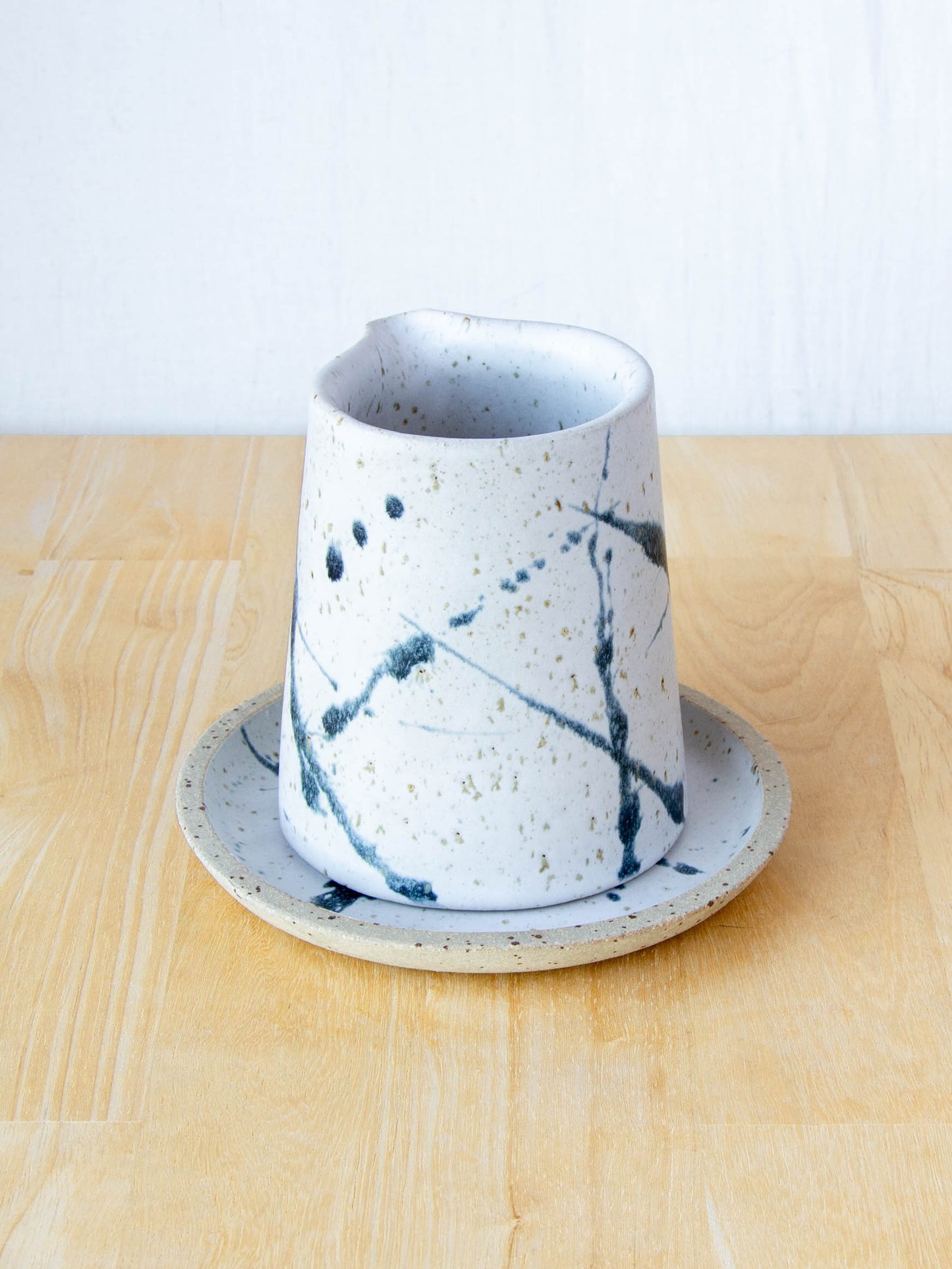 NZ made Ceramic milk jug or sake jug handmade in Queenstown by Land and Line Ceramics. Modern rustic design with a wabi sabi, japandi style