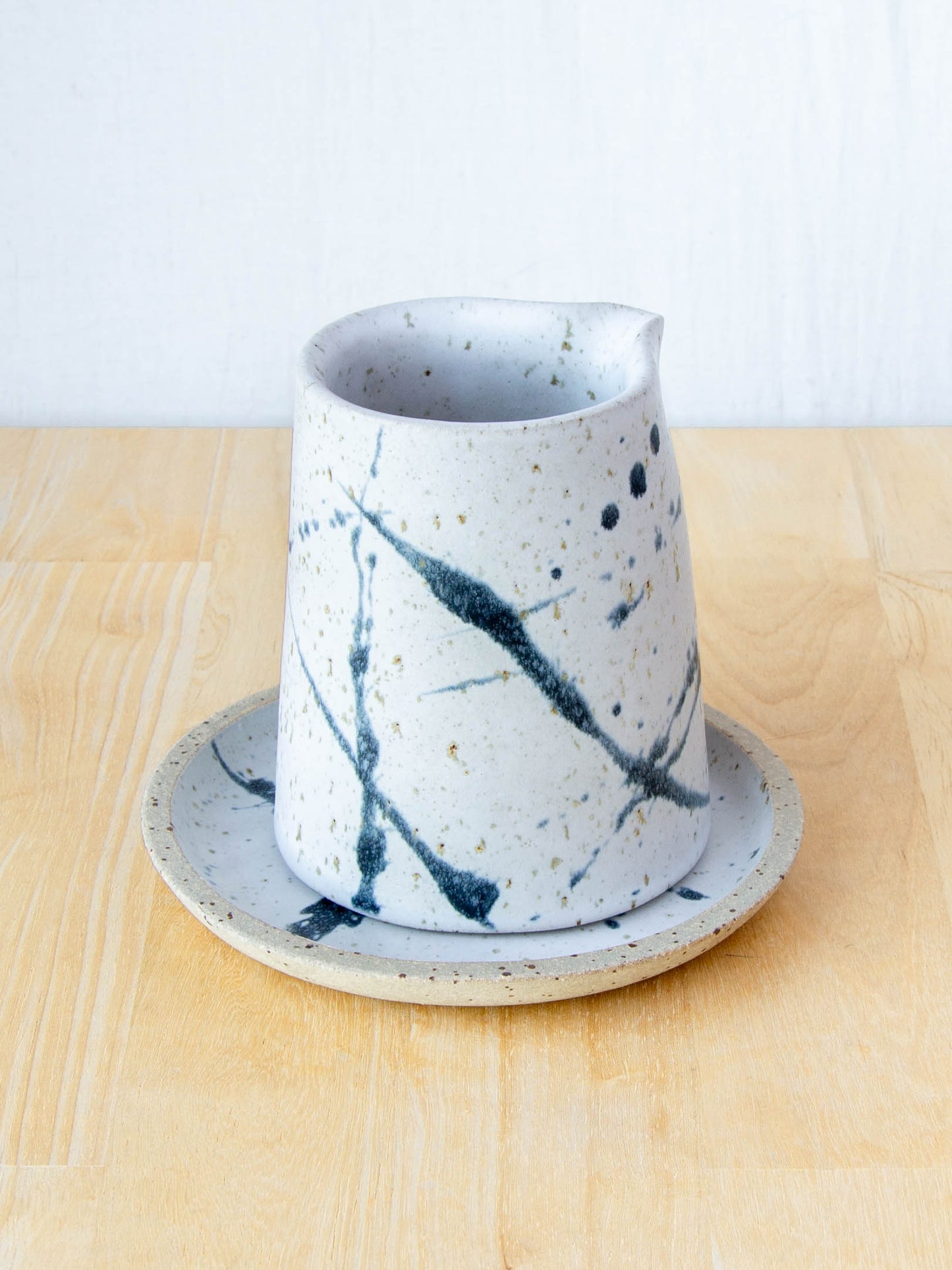 NZ made Ceramic milk jug or sake jug handmade in Queenstown by Land and Line Ceramics. Modern rustic design with a wabi sabi, japandi style