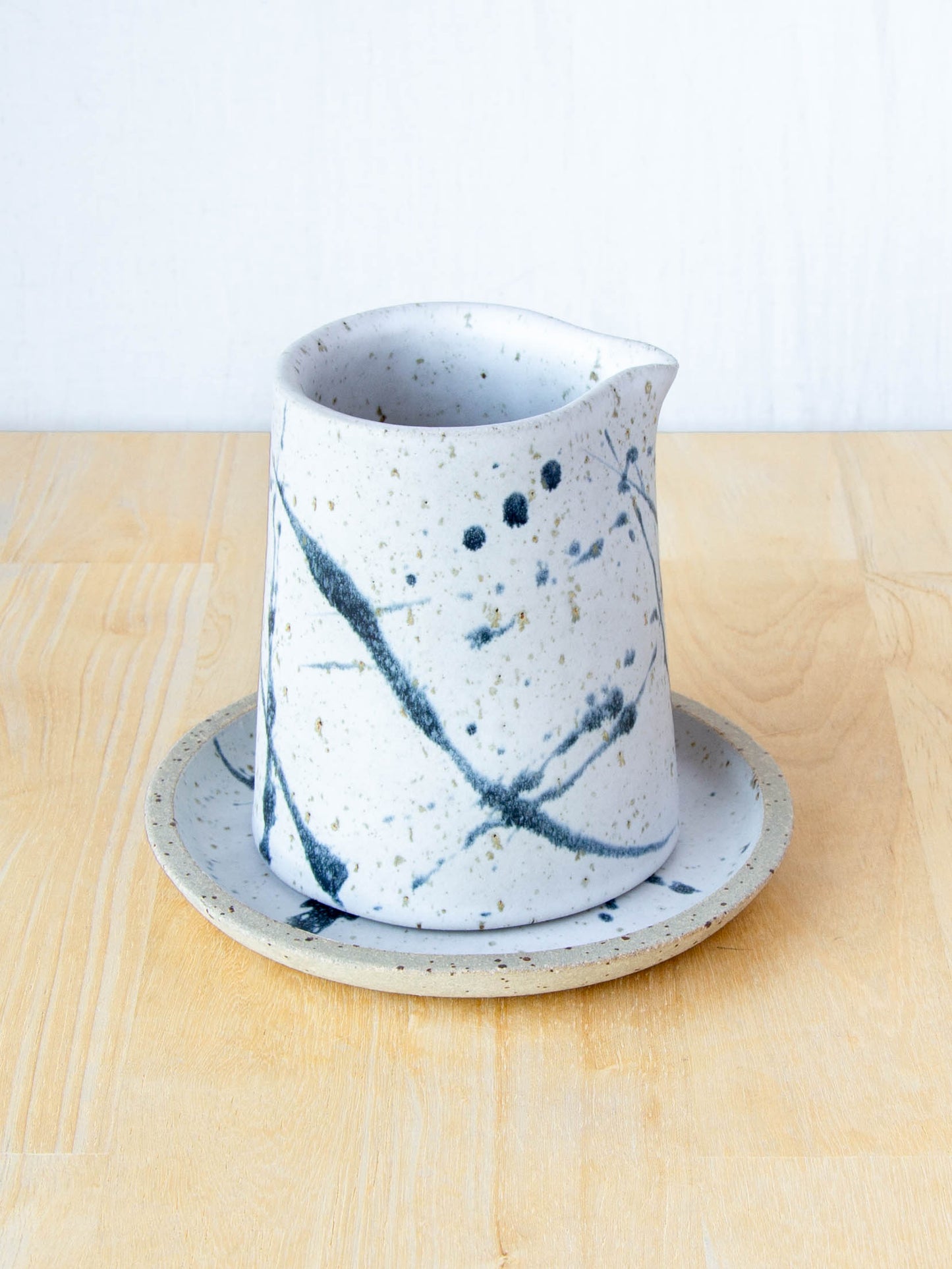 NZ made Ceramic milk jug or sake jug handmade in Queenstown by Land and Line Ceramics. Modern rustic design with a wabi sabi, japandi style