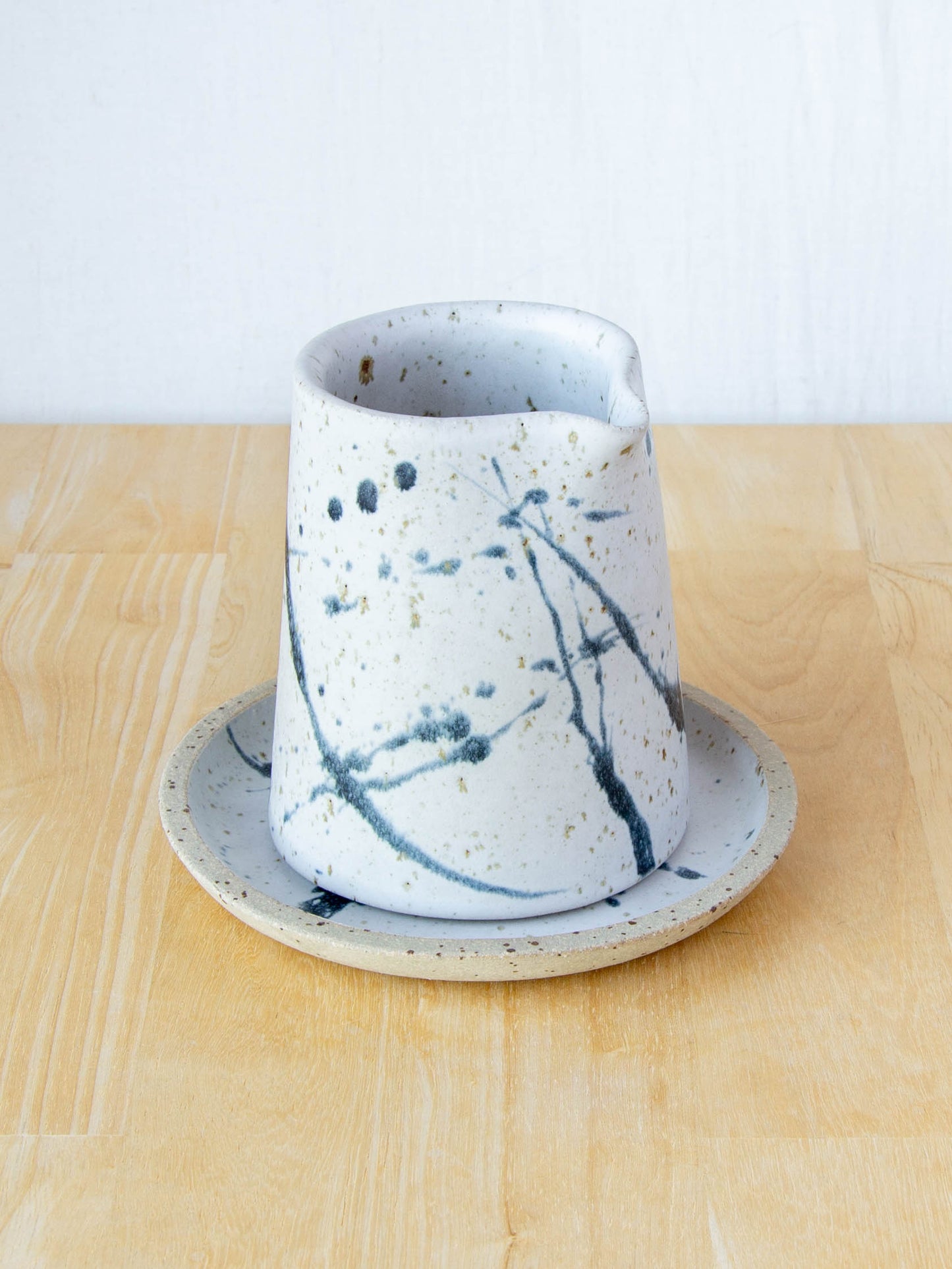 NZ made Ceramic milk jug or sake jug handmade in Queenstown by Land and Line Ceramics. Modern rustic design with a wabi sabi, japandi style