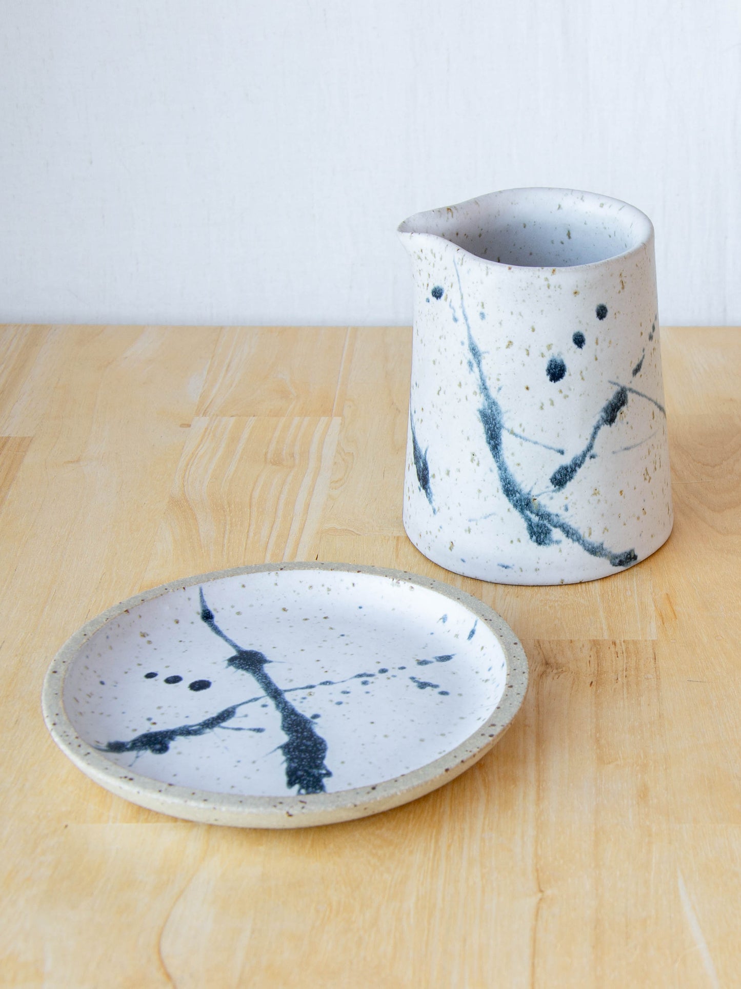 NZ made Ceramic milk jug or sake jug handmade in Queenstown by Land and Line Ceramics. Modern rustic design with a wabi sabi, japandi style