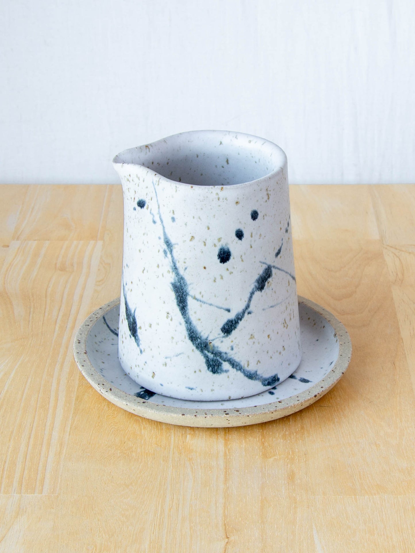 NZ made Ceramic milk jug or sake jug handmade in Queenstown by Land and Line Ceramics. Modern rustic design with a wabi sabi, japandi style