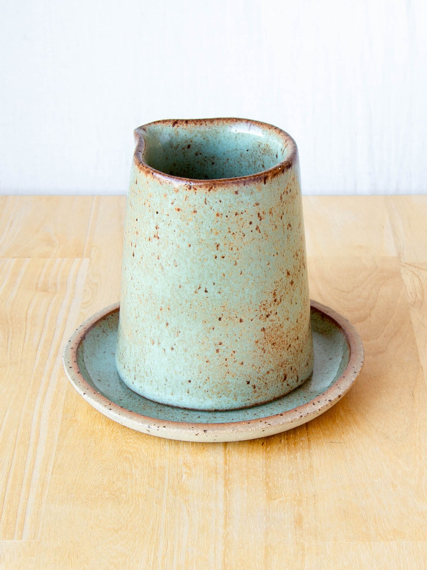 Ceramic milk jug or sake pourer. Handmade in Queenstown, New Zealand by Land and Line Ceramics. Modern rustic design with a wabi sabi, japandi style