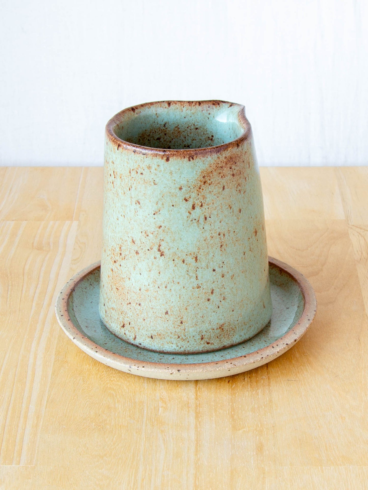 Ceramic milk jug or sake pourer. Handmade in Queenstown, New Zealand by Land and Line Ceramics. Modern rustic design with a wabi sabi, japandi style