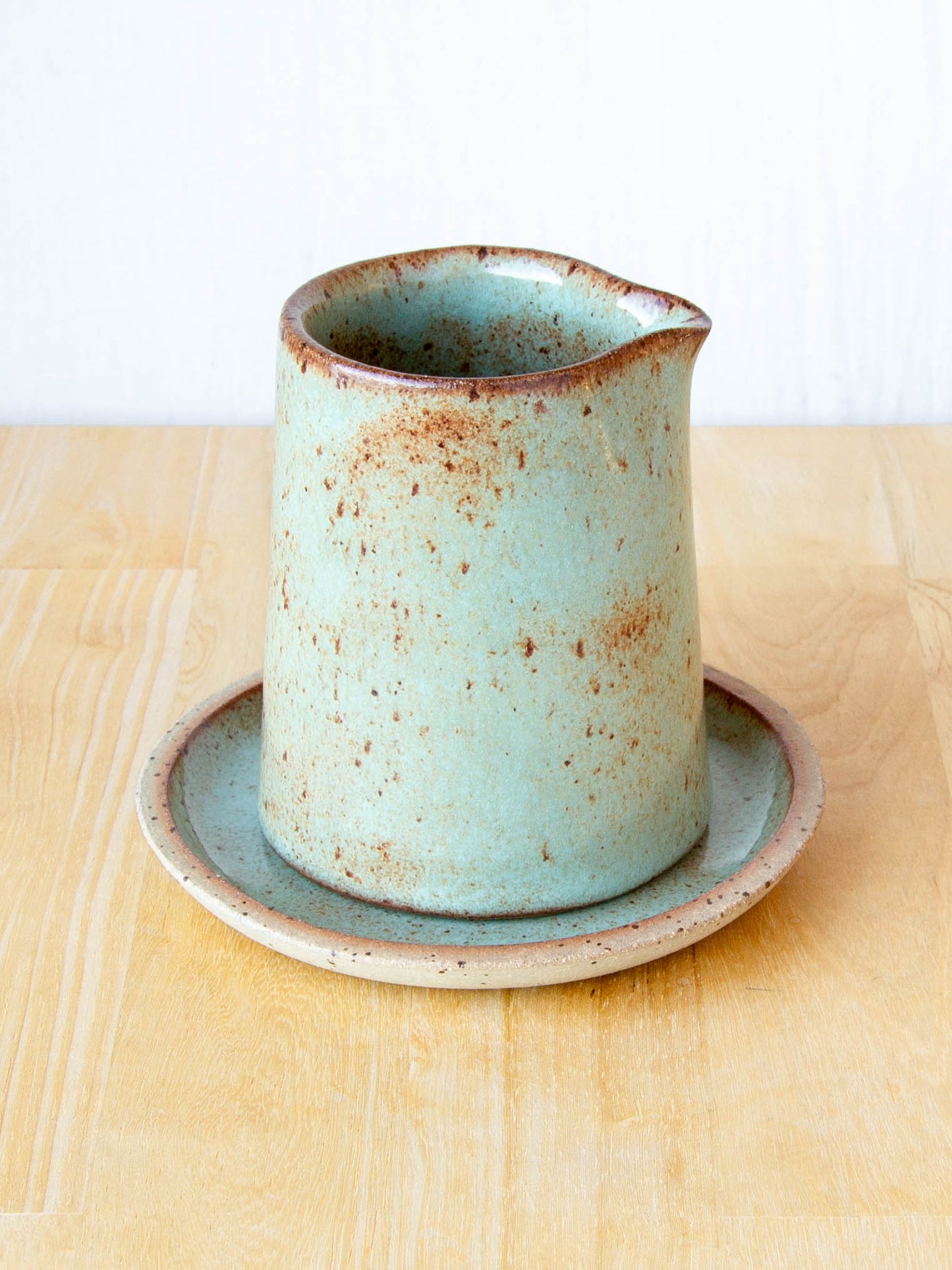 Ceramic milk jug or sake pourer. Handmade in Queenstown, New Zealand by Land and Line Ceramics. Modern rustic design with a wabi sabi, japandi style
