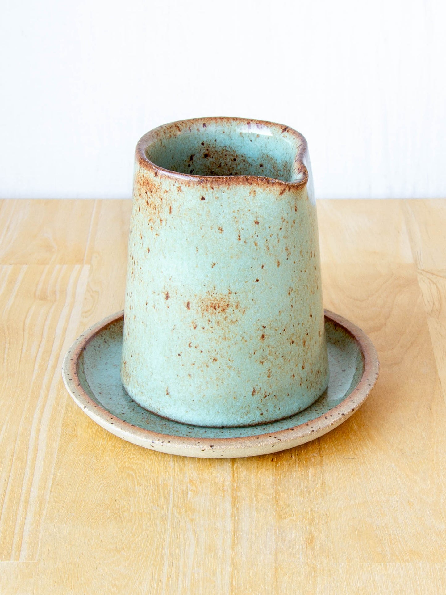 Ceramic milk jug or sake pourer. Handmade in Queenstown, New Zealand by Land and Line Ceramics. Modern rustic design with a wabi sabi, japandi style