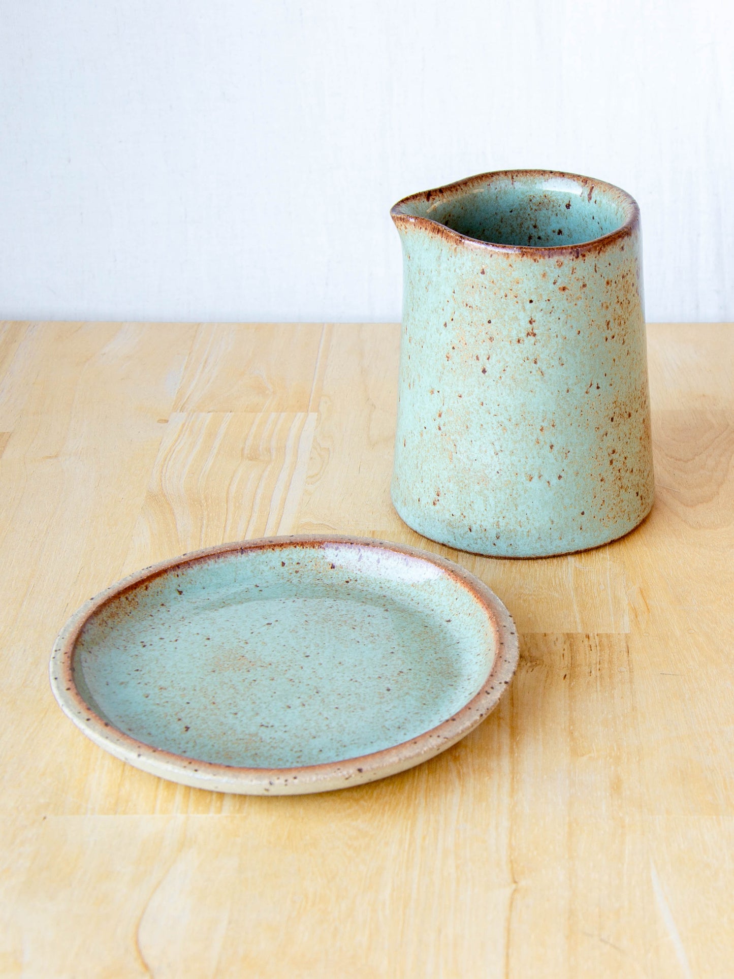 Ceramic milk jug or sake pourer. Handmade in Queenstown, New Zealand by Land and Line Ceramics. Modern rustic design with a wabi sabi, japandi style