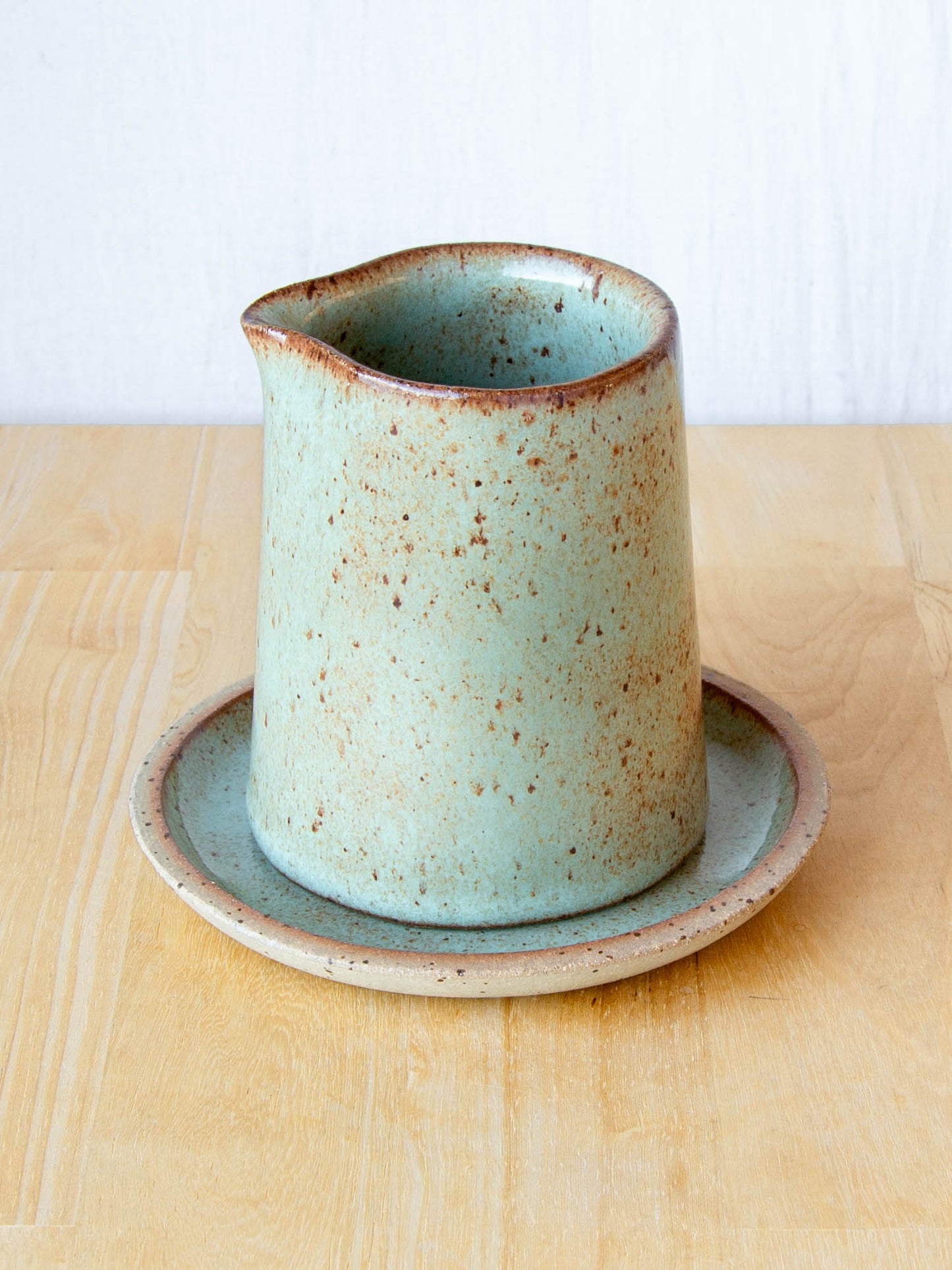 Ceramic milk jug or sake pourer. Handmade in Queenstown, New Zealand by Land and Line Ceramics. Modern rustic design with a wabi sabi, japandi style