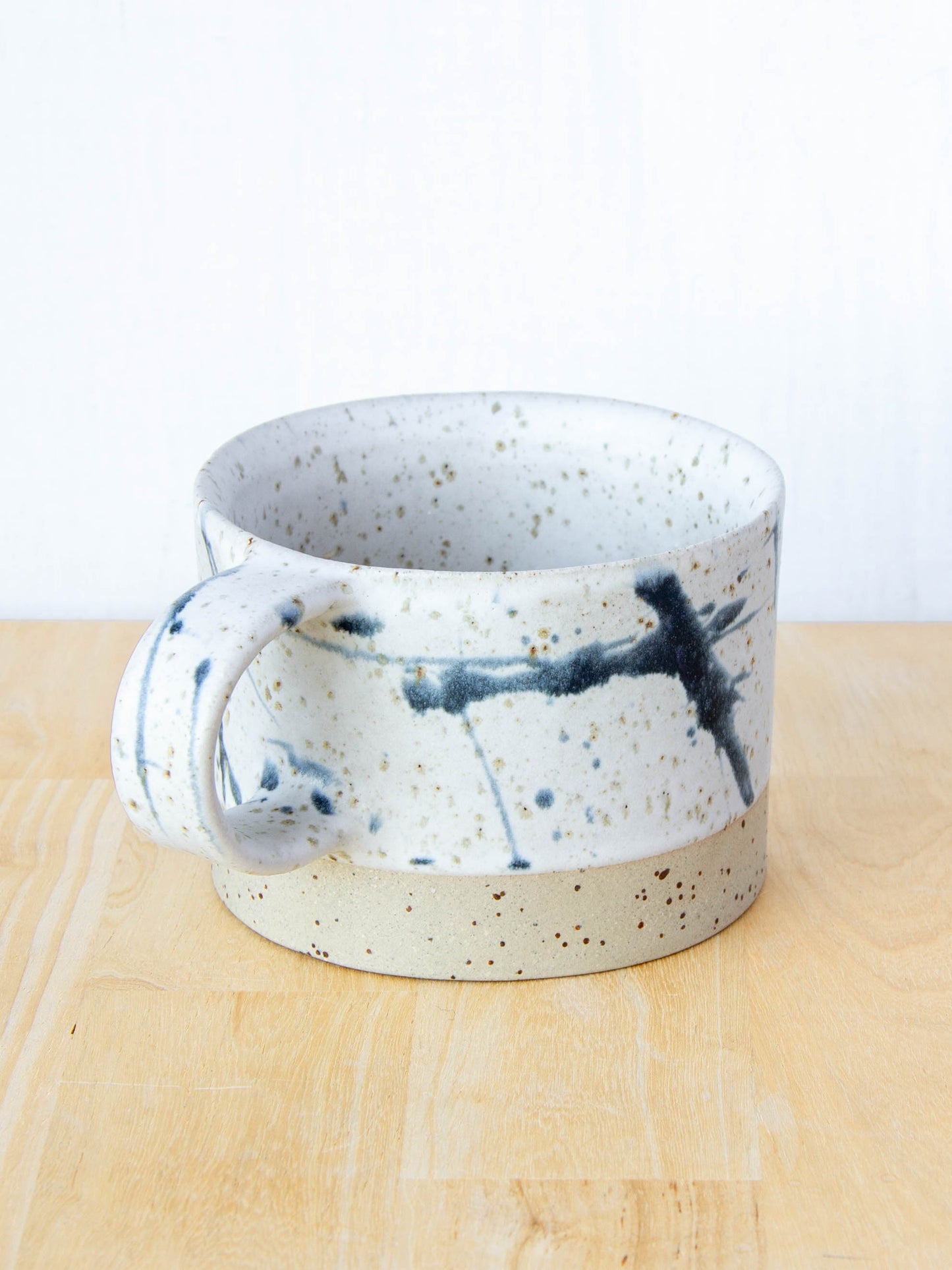 Ceramic coffee cup handmade in New Zealand by Land and Line Ceramics, Modern rustic design with a wabi sabi, japandi style
