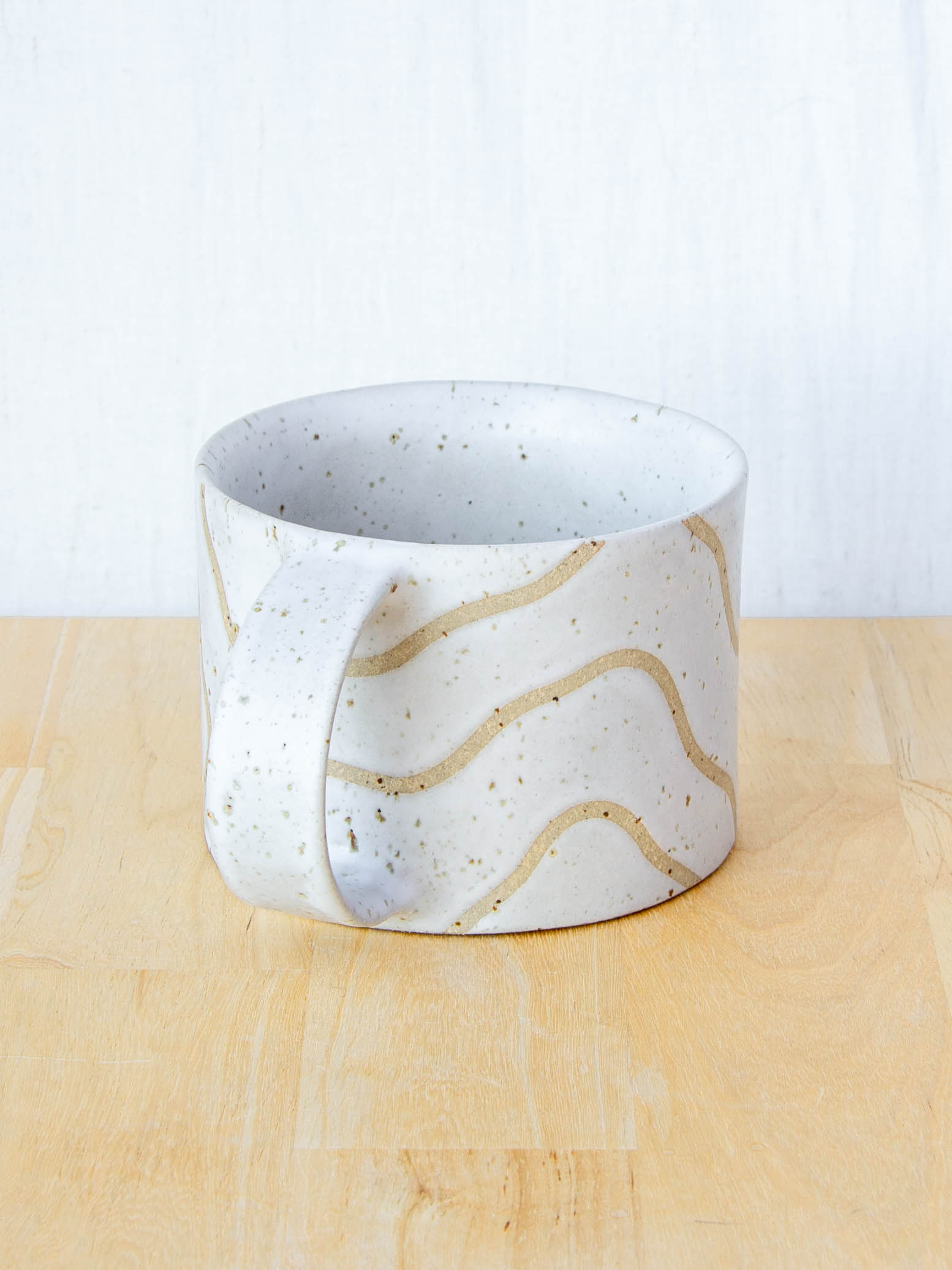 handmade ceramic mug with topographic map design made in New Zealand by Land and Line Ceramics