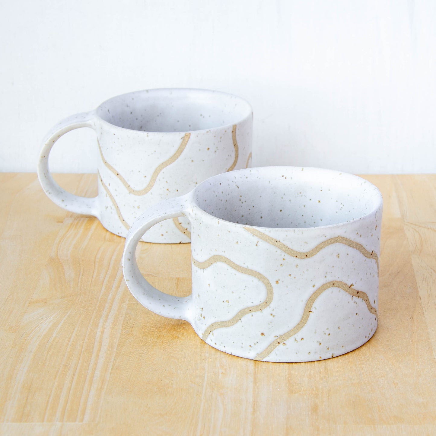 handmade ceramic mug with topographic map design made in New Zealand by Land and Line Ceramics