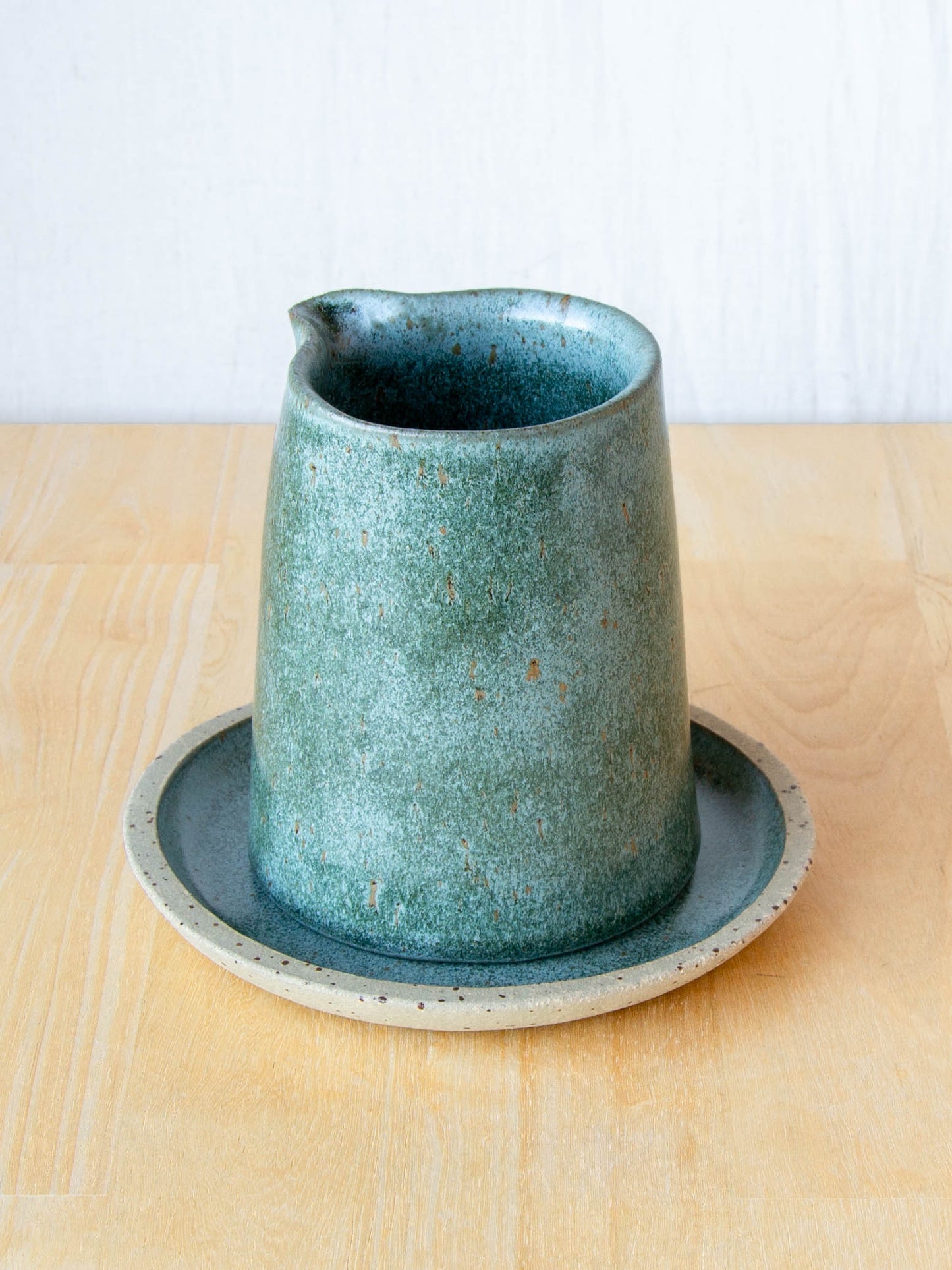 Ceramic milk jug or sake pourer. handmade in New Zealand by Land and Line Ceramics. Modern rustic design with a wabi sabi, japandi style