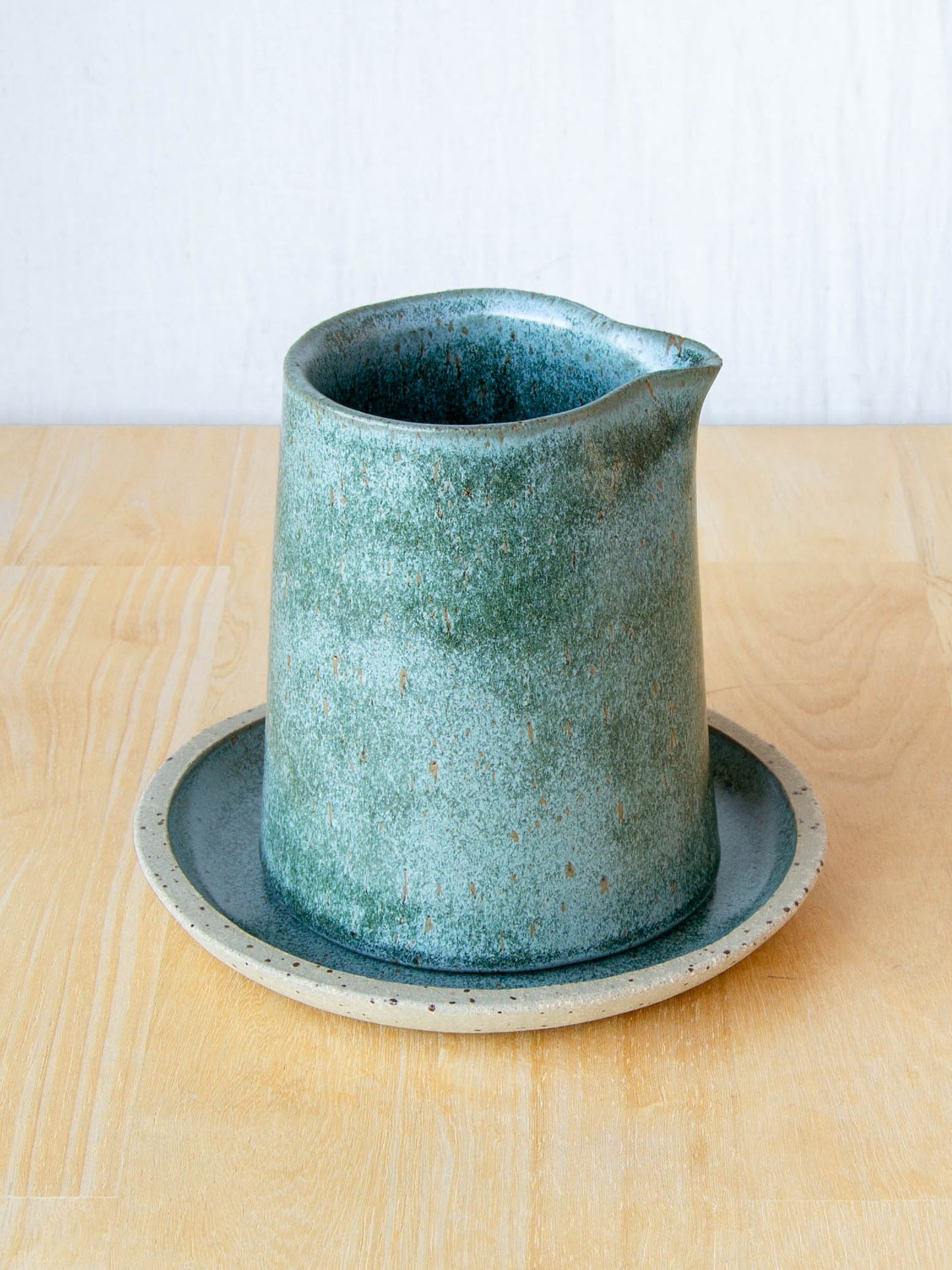 Ceramic milk jug or sake pourer. handmade in New Zealand by Land and Line Ceramics. Modern rustic design with a wabi sabi, japandi style