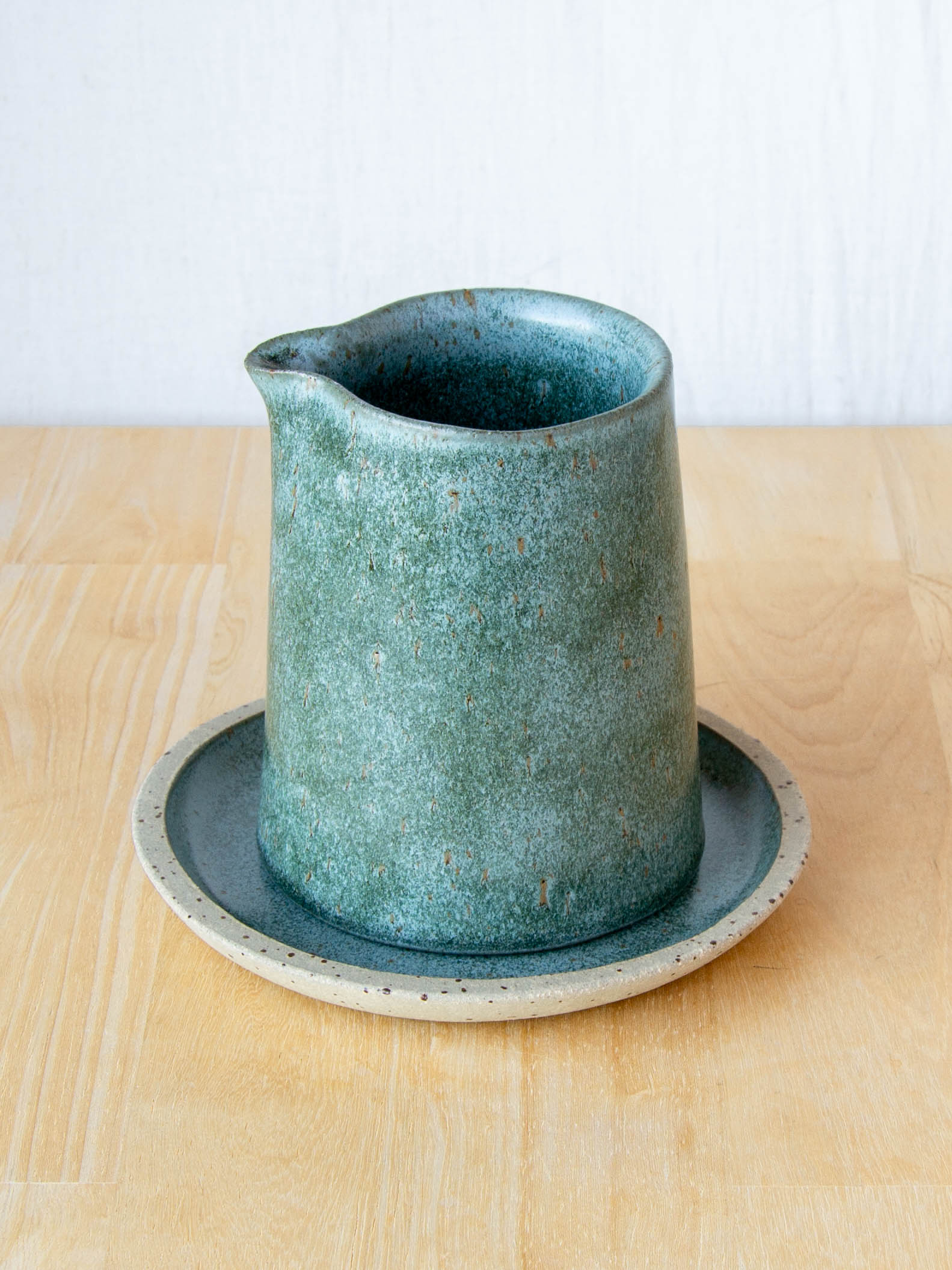 Ceramic milk jug or sake pourer. handmade in New Zealand by Land and Line Ceramics. Modern rustic design with a wabi sabi, japandi style