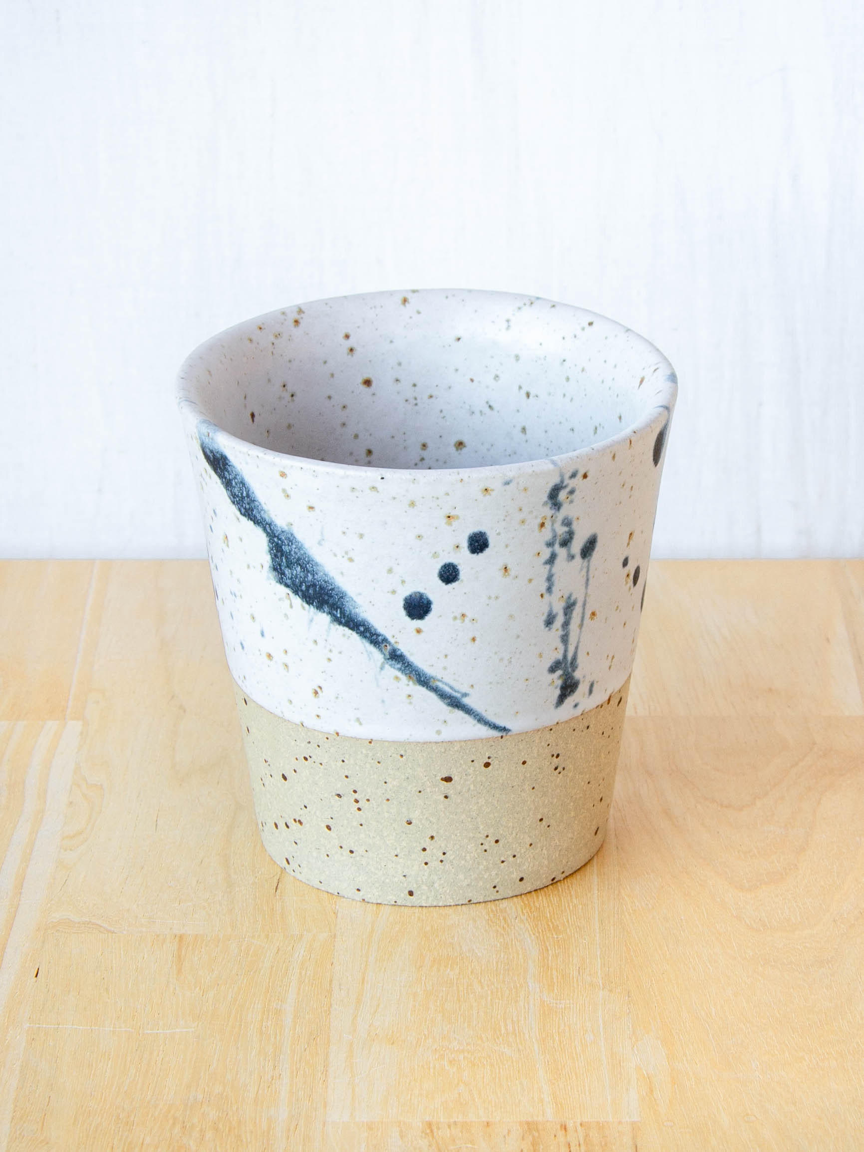 Ceramic coffee cup handmade in New Zealand by Land and Line Ceramics, single-use free, travel cup. Modern rustic design with a wabi sabi, japandi style