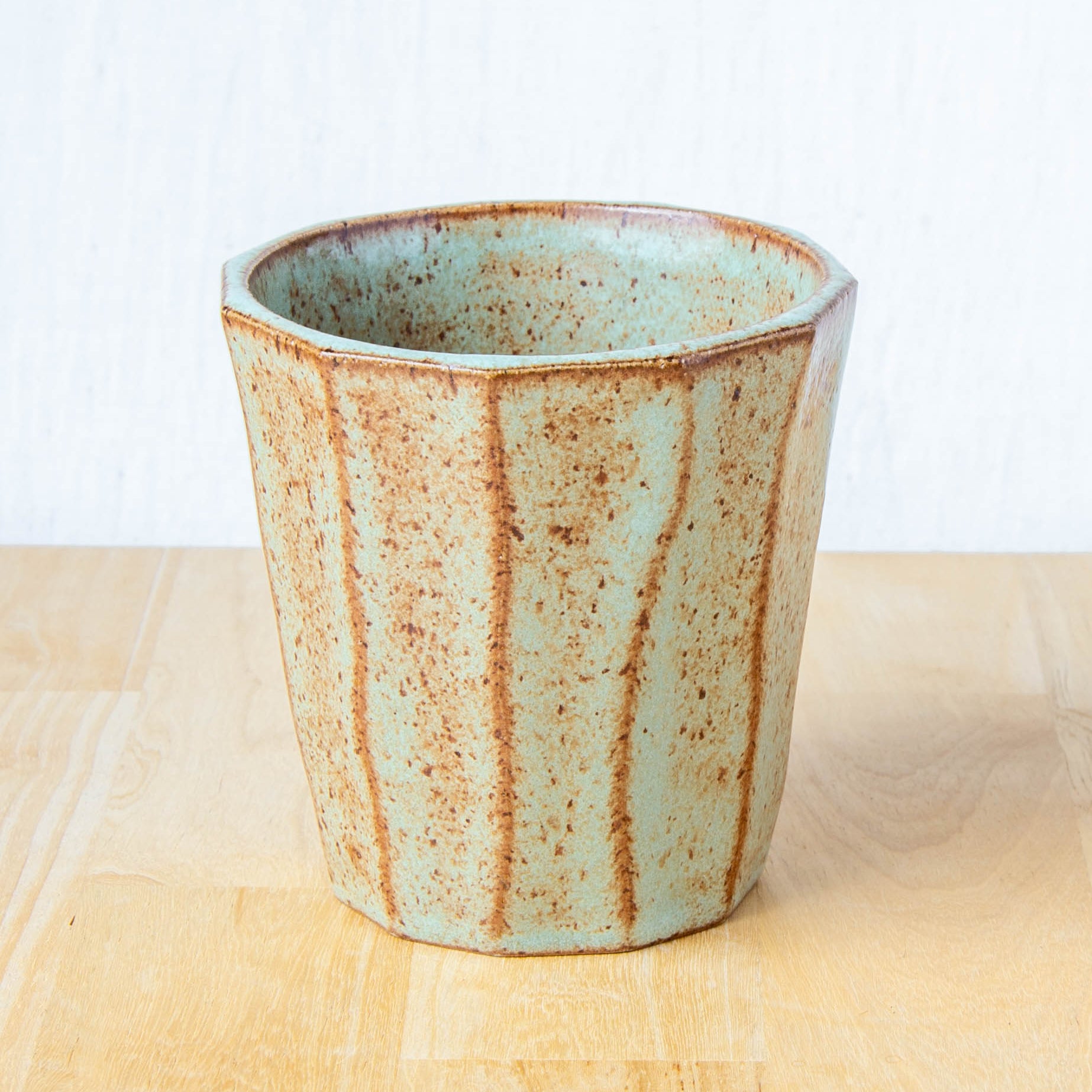 rustic green and brown handmade ceramic cup land and line ceramics new zealand pottery