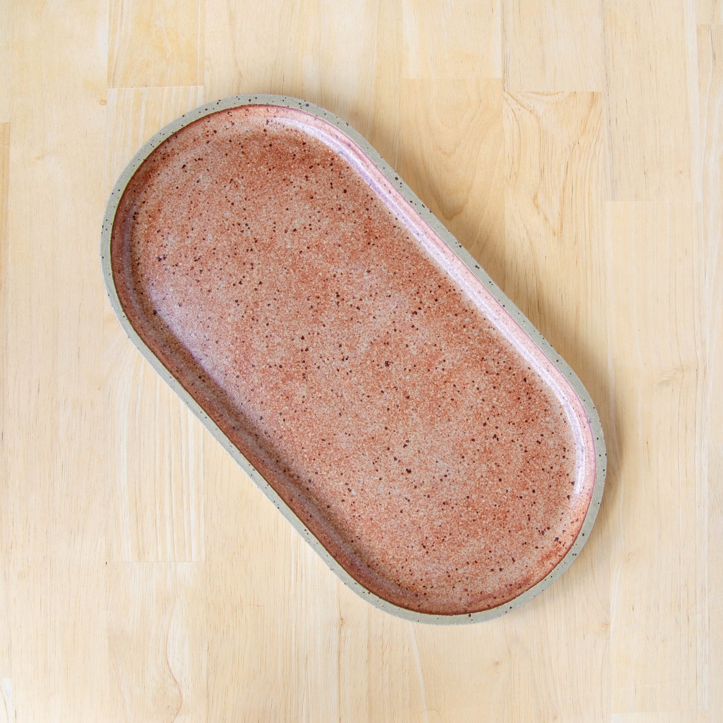 rounded oblong pill shaped plate handmade cheese board platter rustic tussock brown glaze