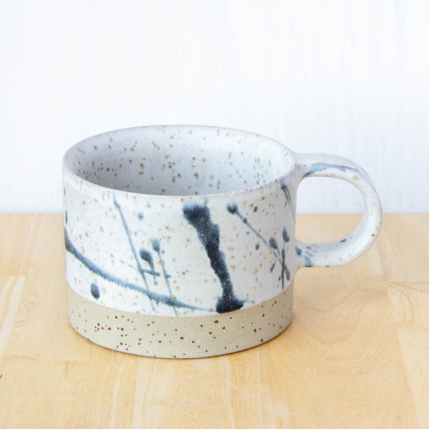 Ceramic coffee cup handmade in New Zealand by Land and Line Ceramics, Modern rustic design with a wabi sabi, japandi style