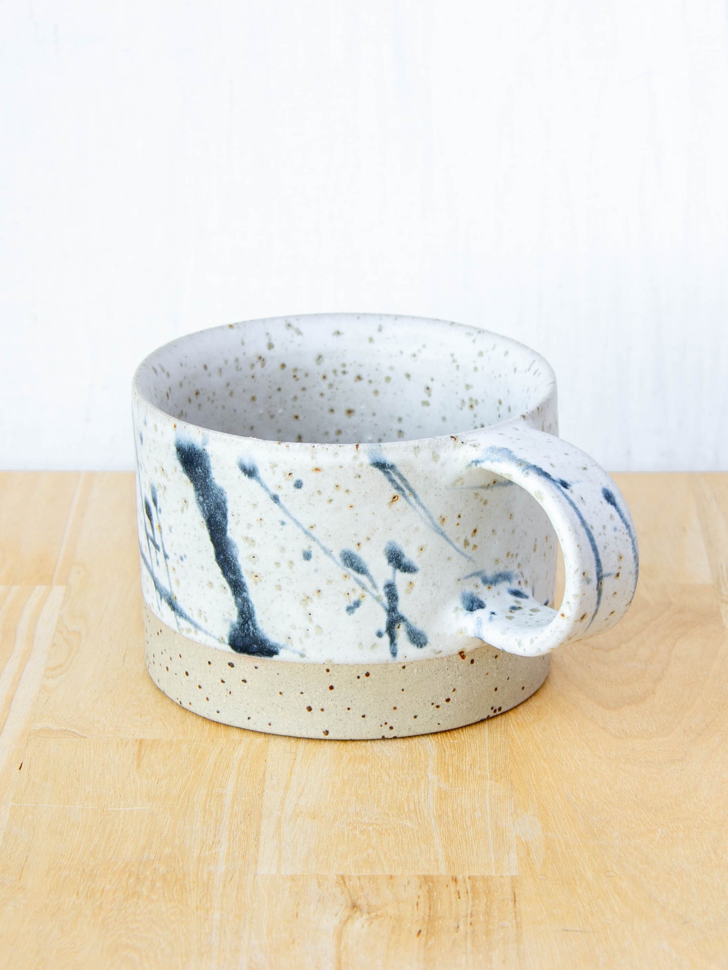 Ceramic coffee cup handmade in New Zealand by Land and Line Ceramics, Modern rustic design with a wabi sabi, japandi style