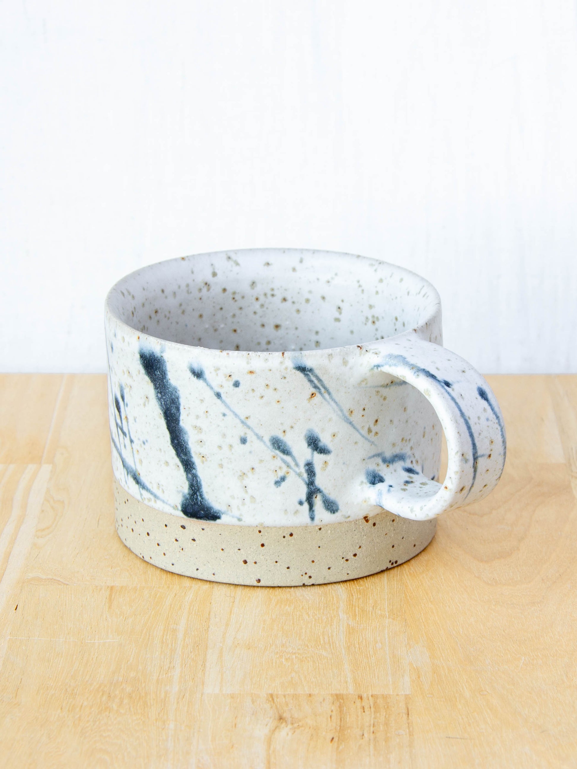 Ceramic coffee cup handmade in New Zealand by Land and Line Ceramics, Modern rustic design with a wabi sabi, japandi style
