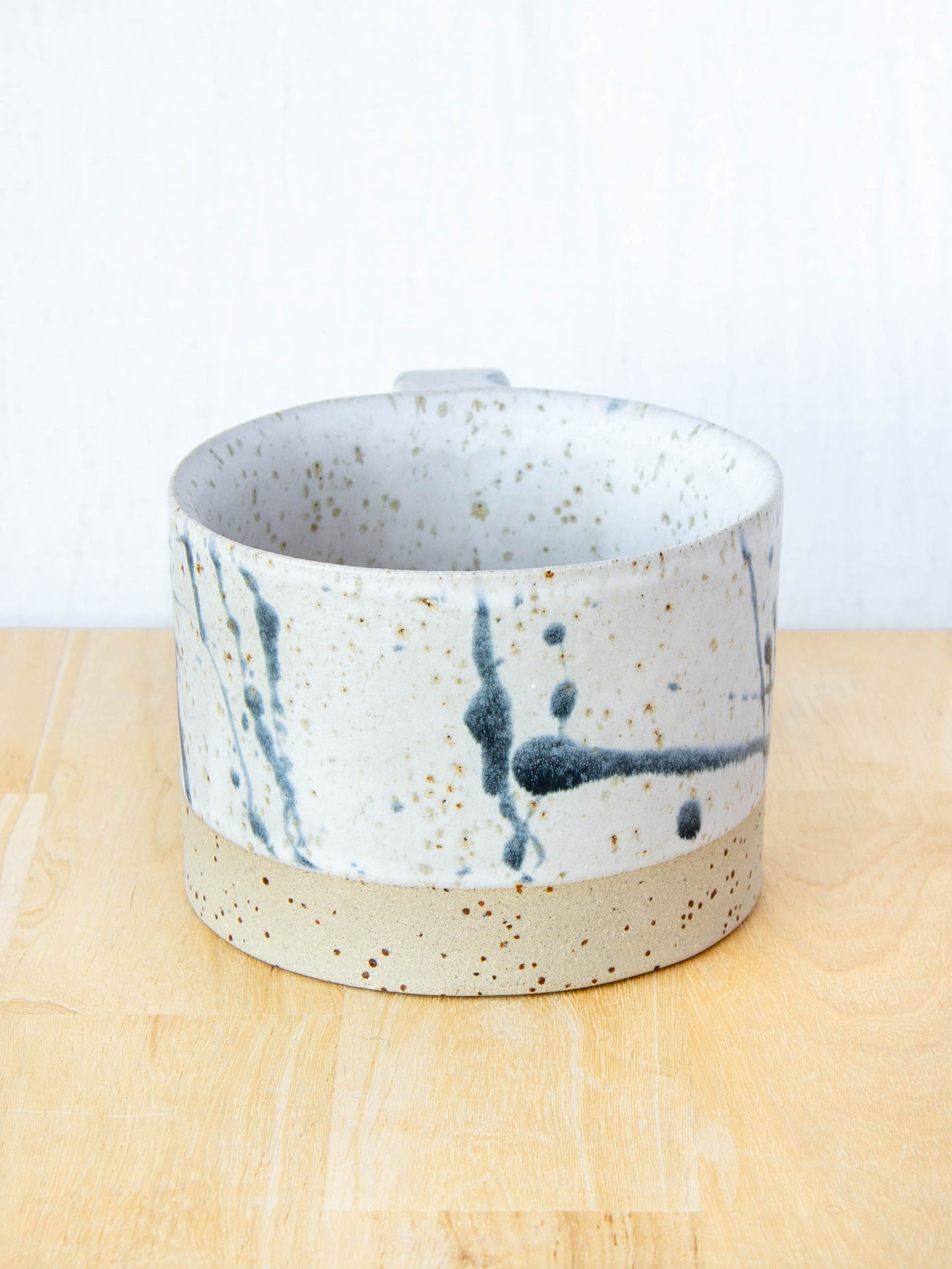 Ceramic coffee cup handmade in New Zealand by Land and Line Ceramics, Modern rustic design with a wabi sabi, japandi style