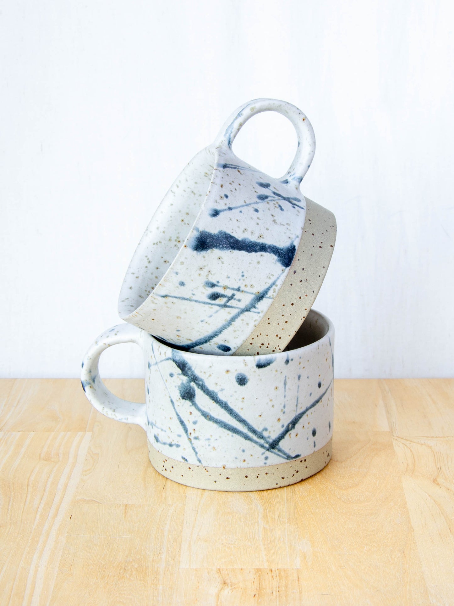 Ceramic coffee cup handmade in New Zealand by Land and Line Ceramics, Modern rustic design with a wabi sabi, japandi style